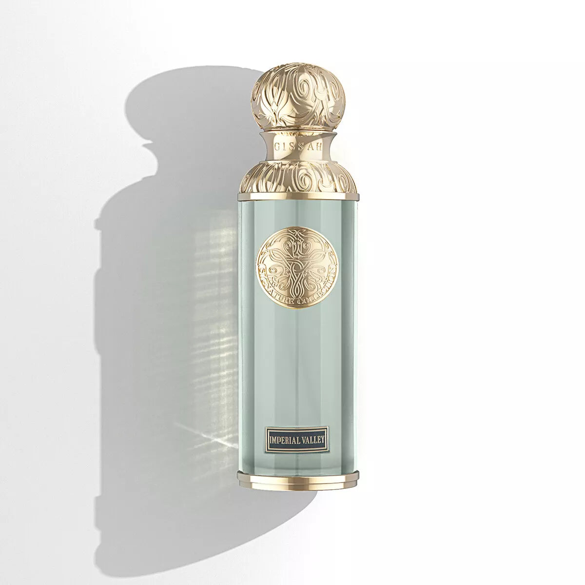 alt="Flacon du parfum Gissah Imperial Valley sur fond oriental"